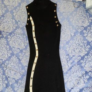 Sleeveless black and white ribbed mini dress